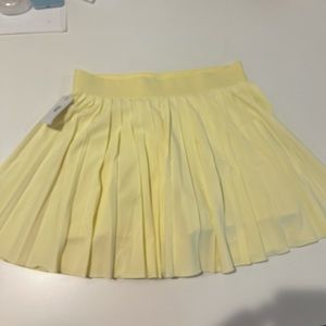 Aritzia pale yellow tennis skirt NWT
